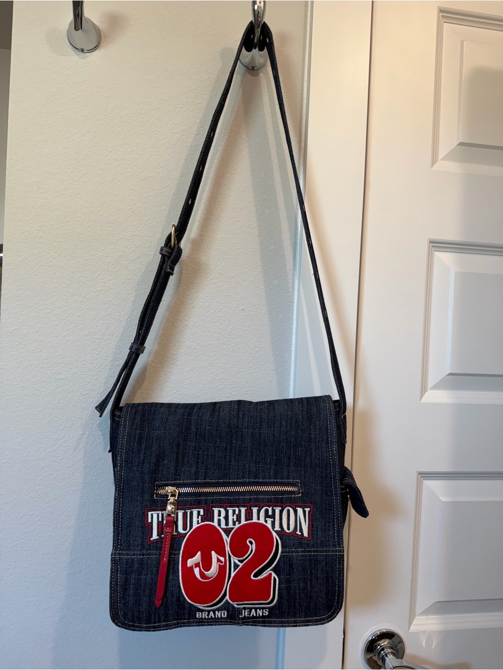 True Religion Denim Messenger Bag with Red Logo Accent